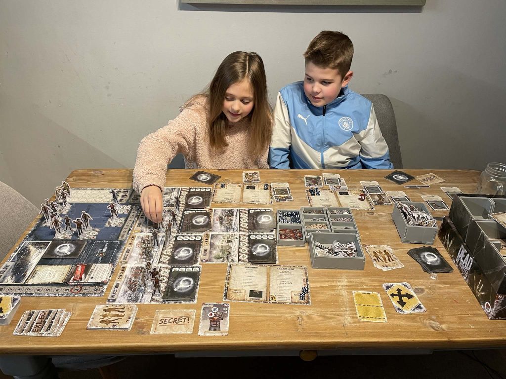 Dead of Winter is not rated for young children but my kids love the game and make great decisions