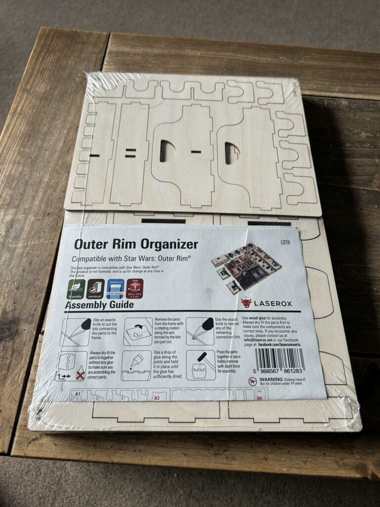 The outer rim insert in packaging on the desk