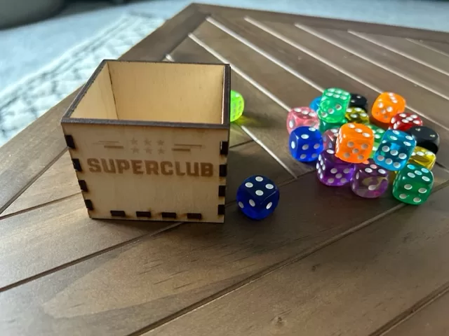 A Dice holder for SuperClub Storage Solution